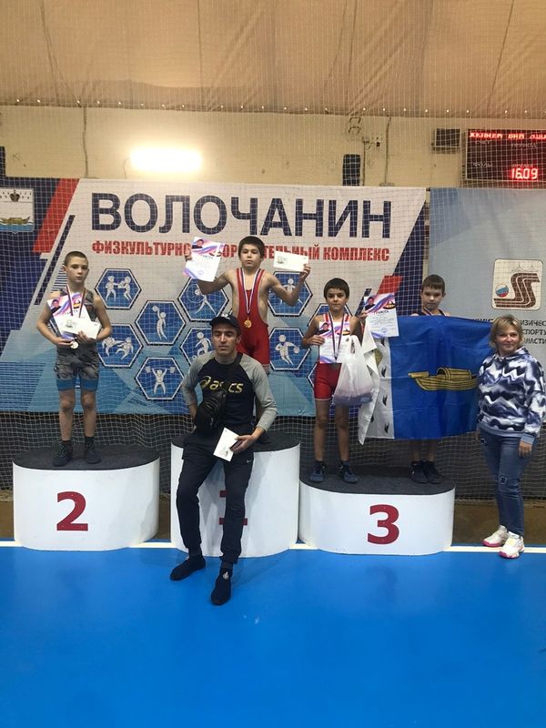 Металлолом вышний волочек. Центр ММА, Кемерово. Спортсмен с медалью. Медали на соревнования фото.