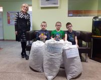 Три мешка "добрых" крышечек