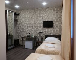 Двухместный номер с 2 отдельными кроватями и душем