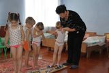 Ходьба по массажной дорожке