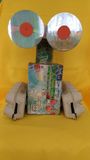 Робот  «Танк»,  авторы работы: Шипулина Л., Шипулина С. А., изготовлен из материала:  Картон, бумага, проволока, диски, крышки.