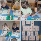 Аппликация в группе "Звездочка ". Тема: "Разноцветные огоньки в домиках"