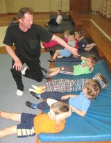 Тренер по спортивной гимнастике с будущими чемпионами!