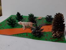 Подберезная Александра, 4 класс "Амурский тигр в осеннем лесу"